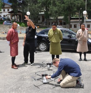 Prime Minister Tshering Tobgay talks to Matternet CEO Andreas Raptopoulos as Health Minister Tandin Wangchuk looks on.Tshering Tobgay’s Facebook